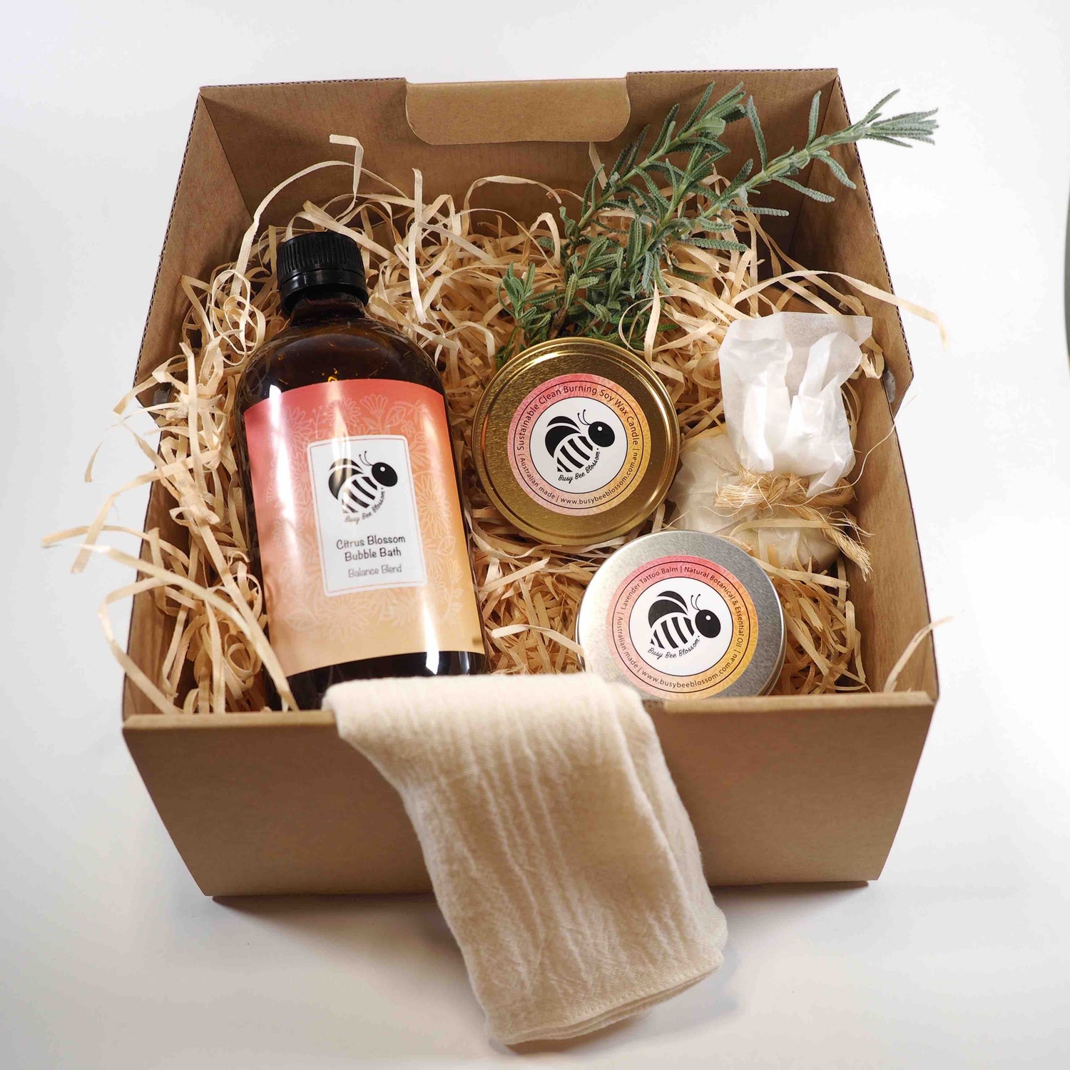 Bubble and Glow Gift Set with Citrus Blossom Bubble Bath, Candle, Cleansing Bar Soap, Lavender Tattoo Body Balm and Chocolates.