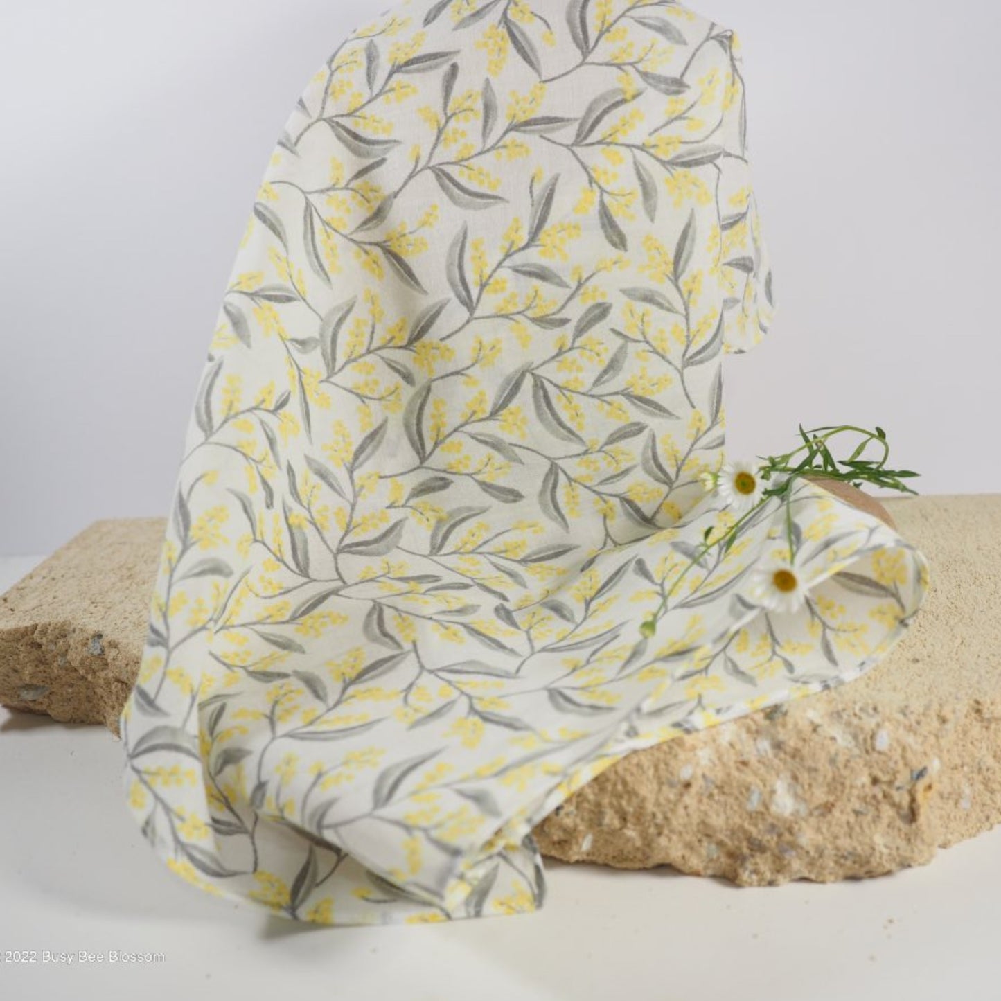 Handmade organic cotton muslin face cloth in wattle flower pattern
