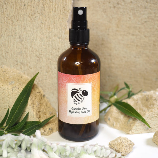 Camellia Ultra Hydrating Face Oil with Sweet Almond, Camellia and Evening Primrose oils. Organic botanical oils for cleansing and hydrating facial skin.