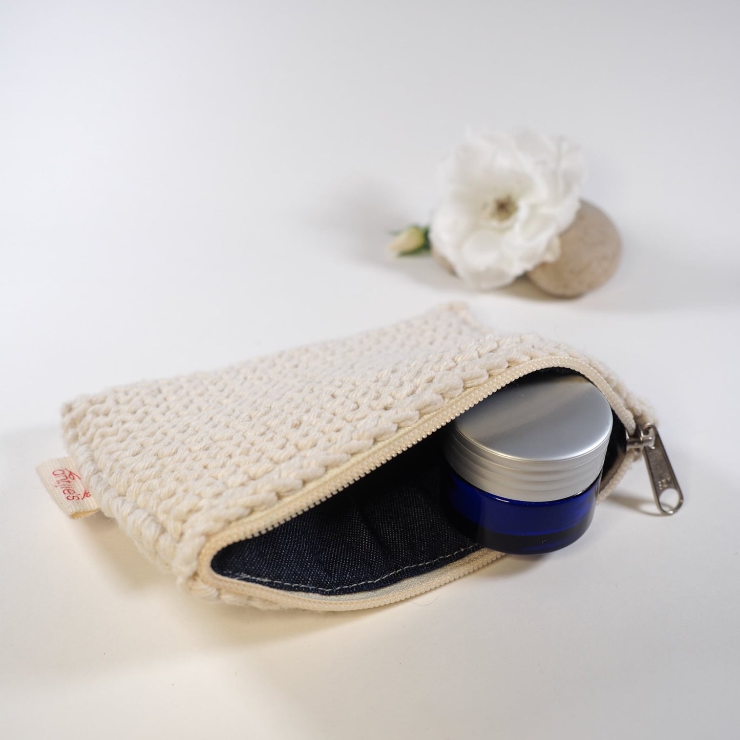 Cotton lip balm bag open with Honey Argan Lip Balm, rock and rose.