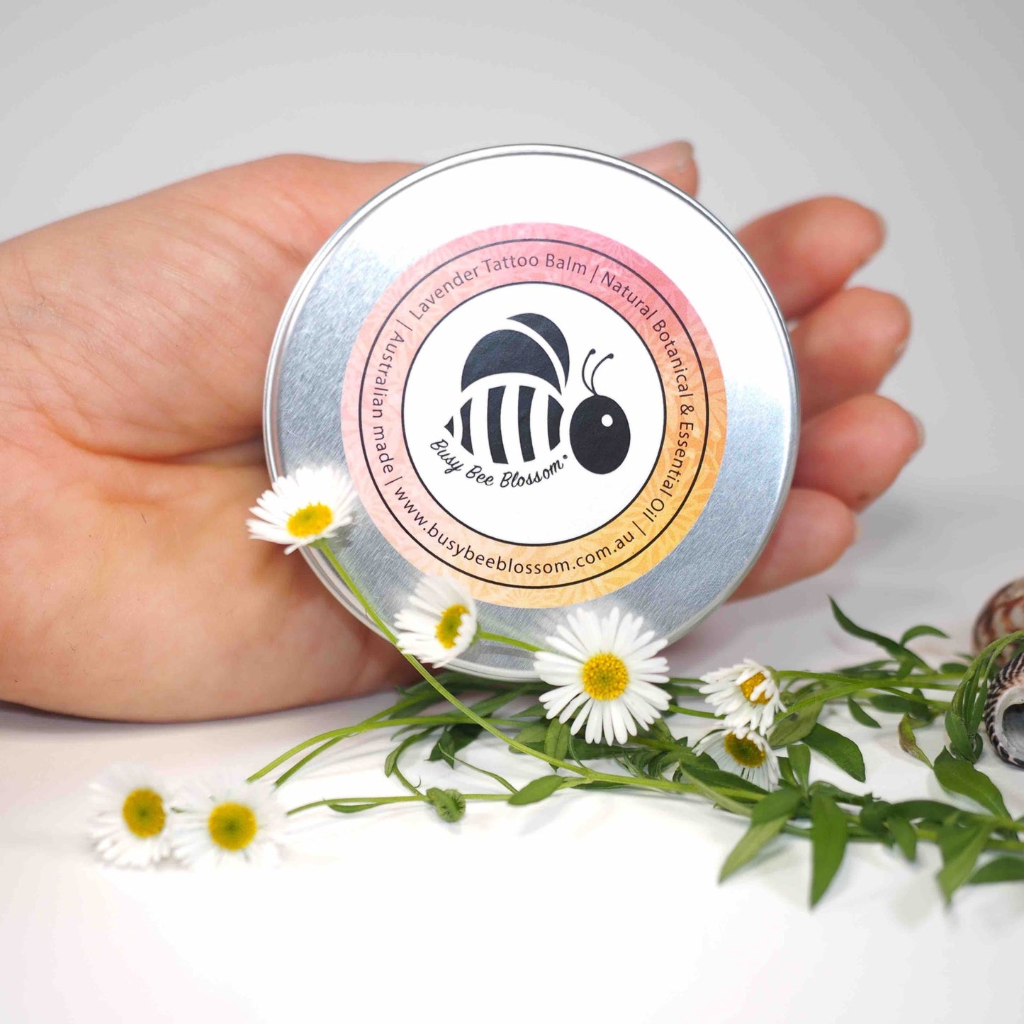 Organic Lavender Tattoo Balm inland with flowers