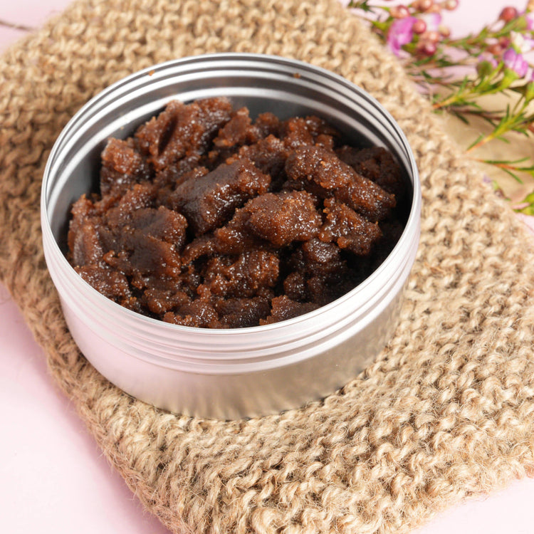 Calm Sugar Body Scrub in aluminium canister on an Exfoliating Mitt.