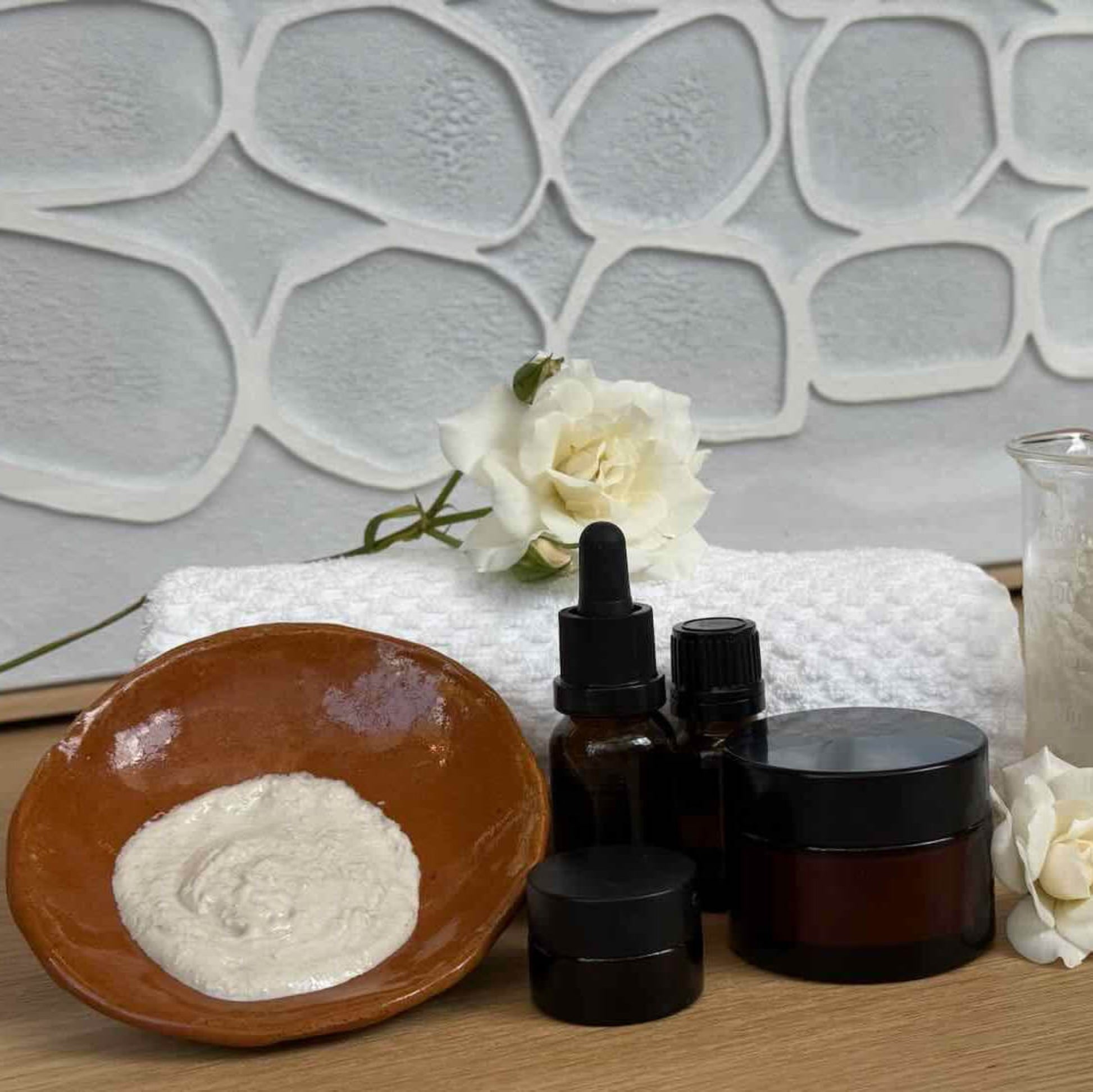 Apricot kernel face scrub made up with amber bottles and jars