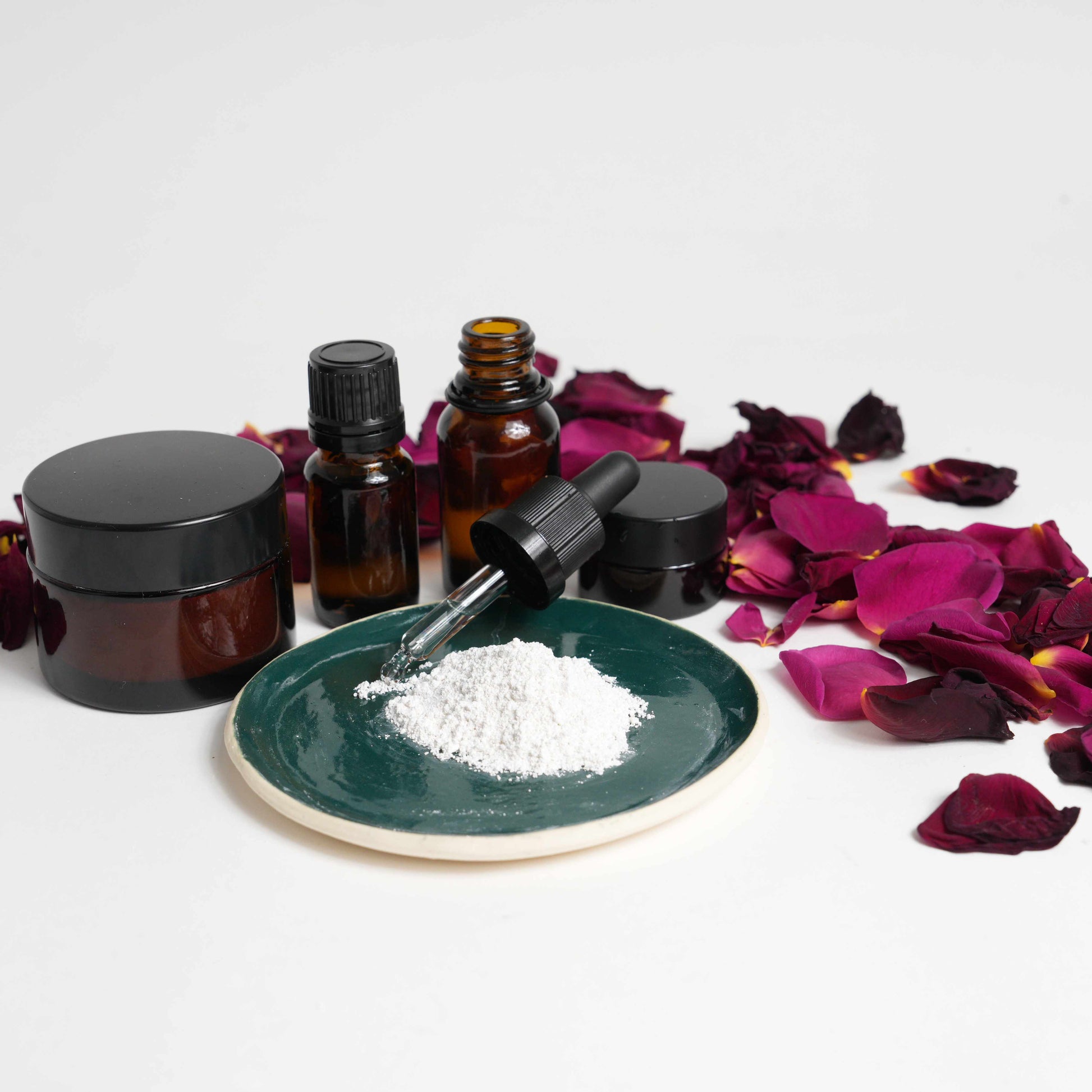 Apricot kernel oil face scrub with clay on ceramic plate and dripper