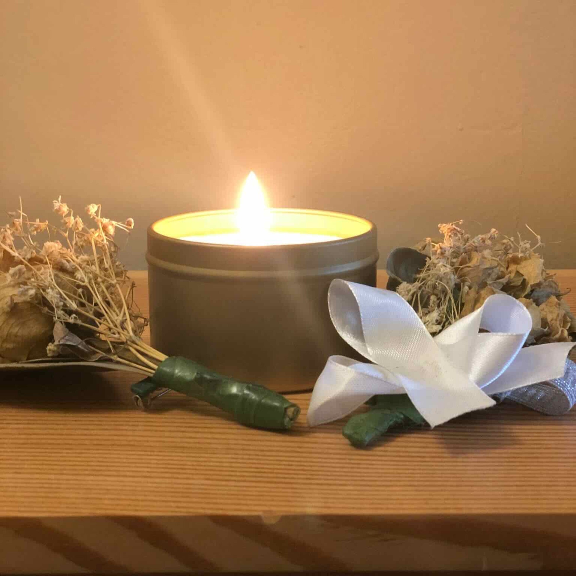 Coconut and soy wax candle with wedding bouquet