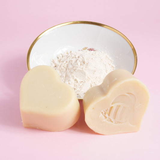 Colloidal oatmeal soap for sensitive skin with a bowl of colloidal oatmeal