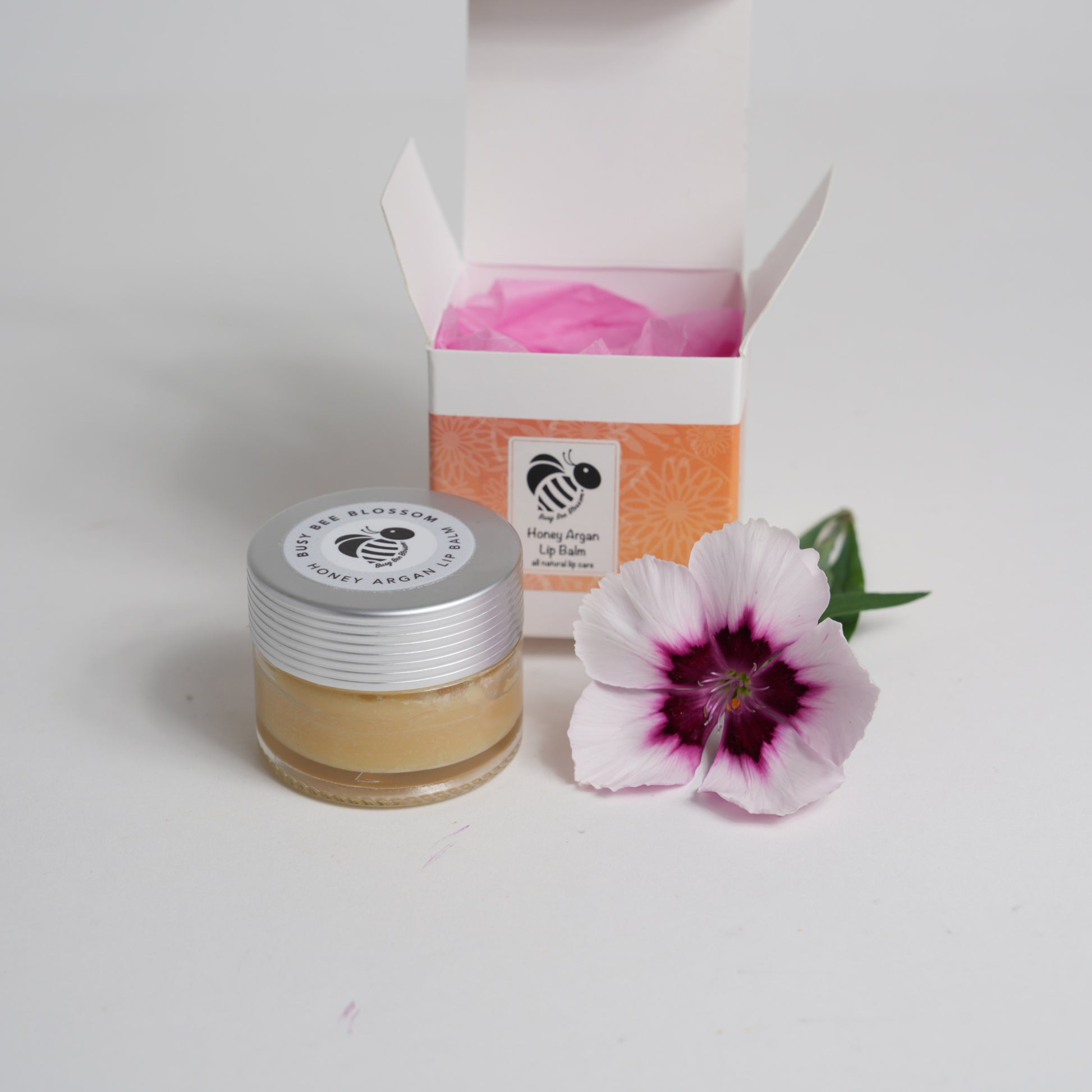 Honey Argan Lip Balm with box and flower
