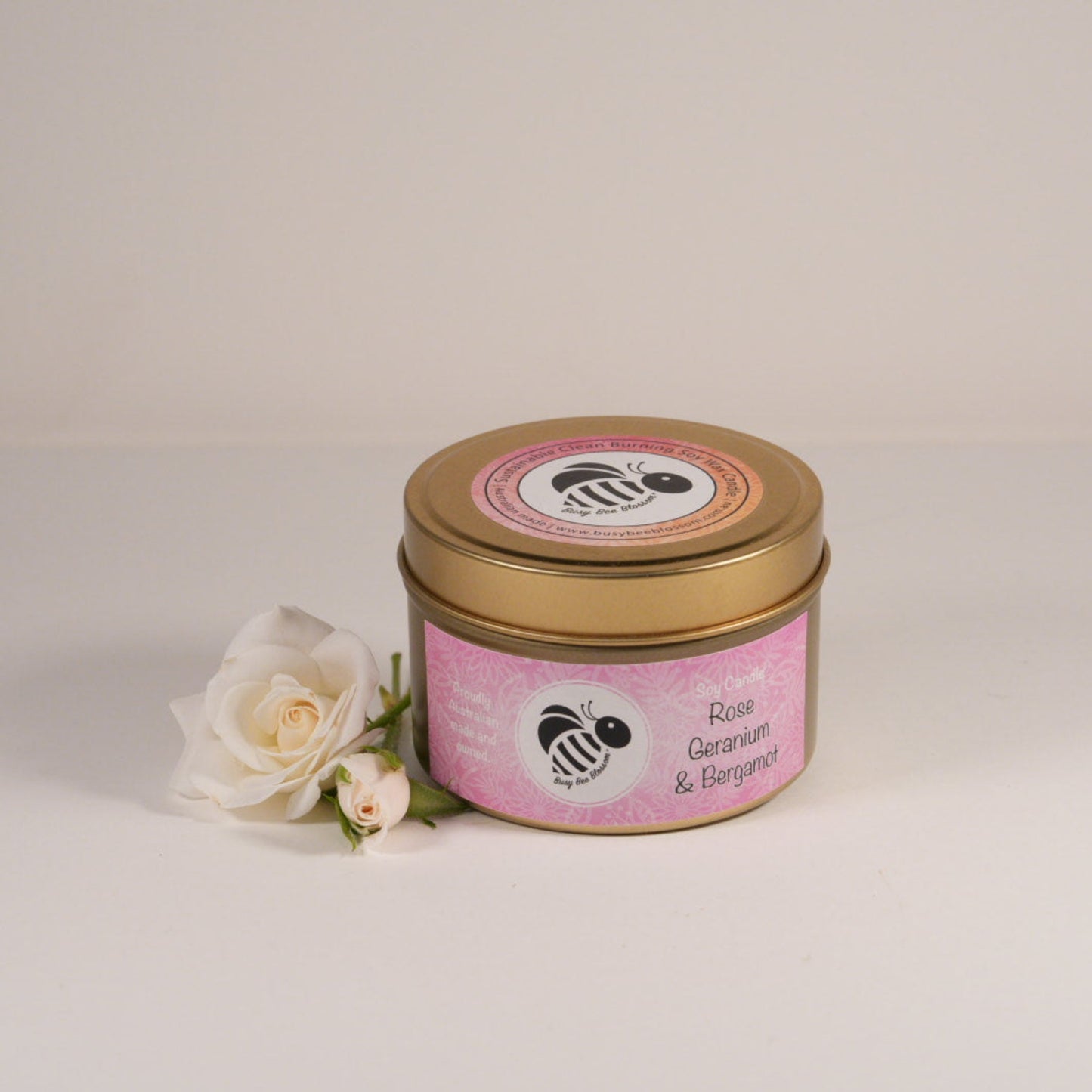 Rose Geranium and Bergamot Gold Travel Tin Soy Candle with roses