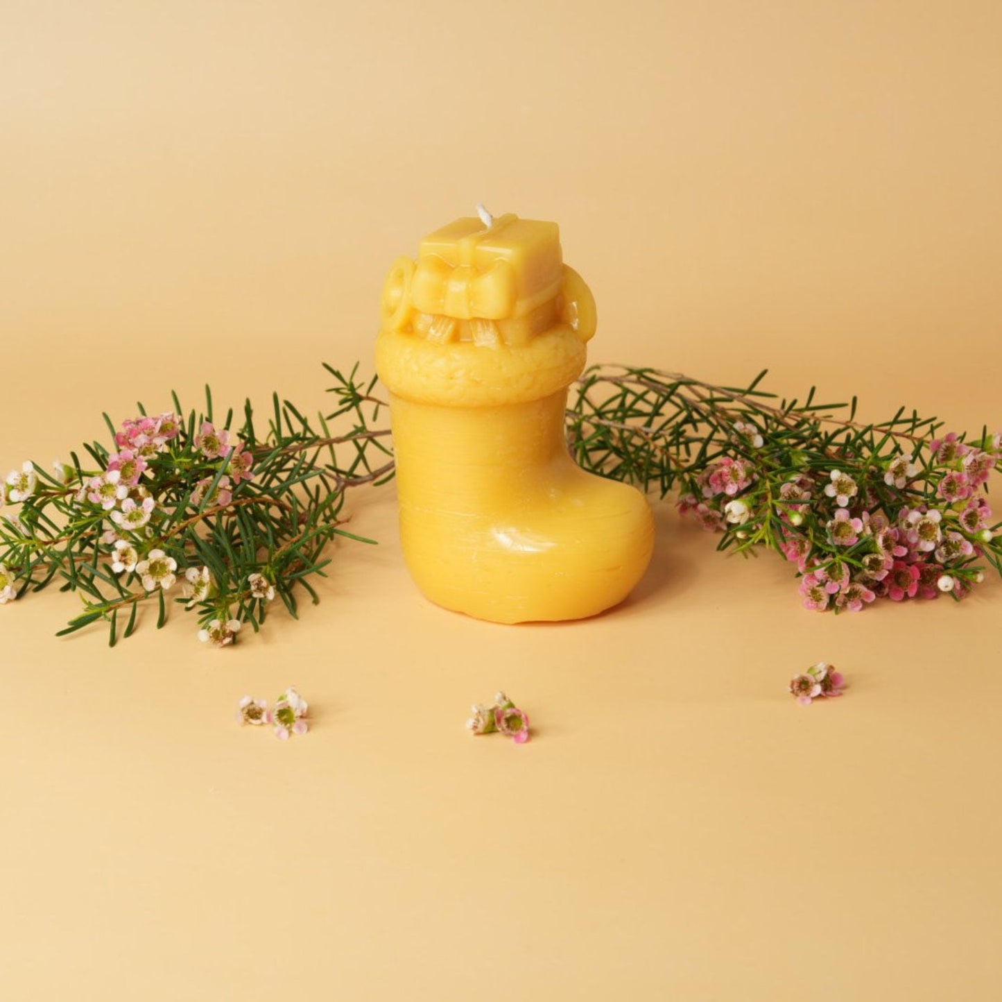 Beeswax candle in Christmas stocking