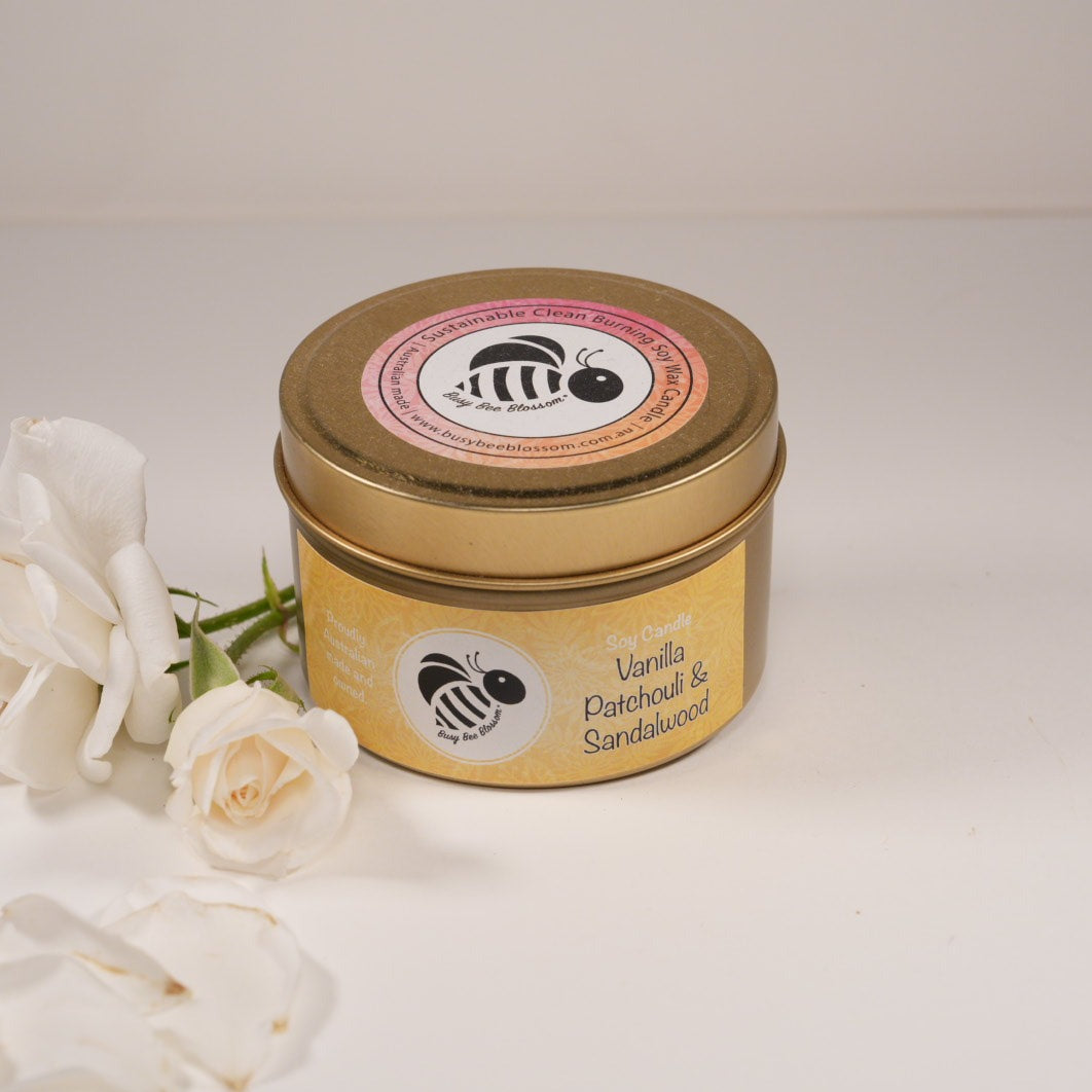 Vanilla Patchouli and Sandalwood Gold Travel Tin Candle with roses