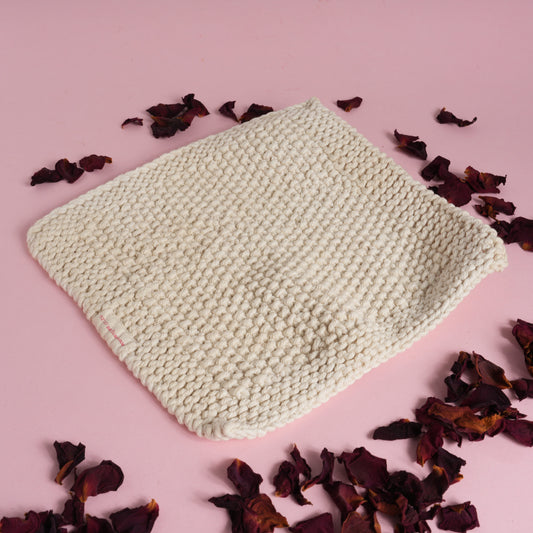 Hand knitted cotton face cloth for gentle exfoliation