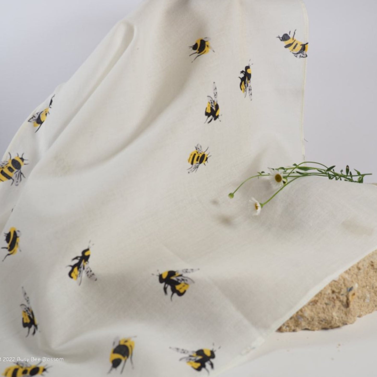 Cotton muslin face cloth with bees buzzing design